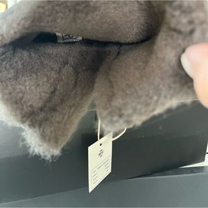 Platform warm sheepskin lining and suede outer side of boots. New never worn